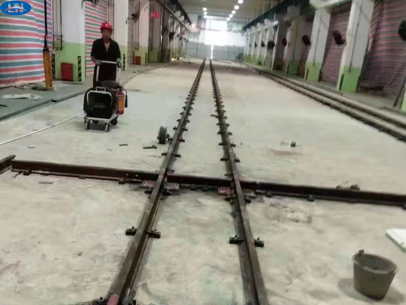 Mètode de processament pre-incrustat de la pista de transferència elèctrica ferroviària
