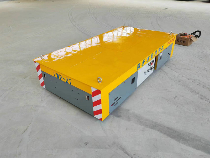 Trolley de trasllat sense pista per a la manipulació de motlles
